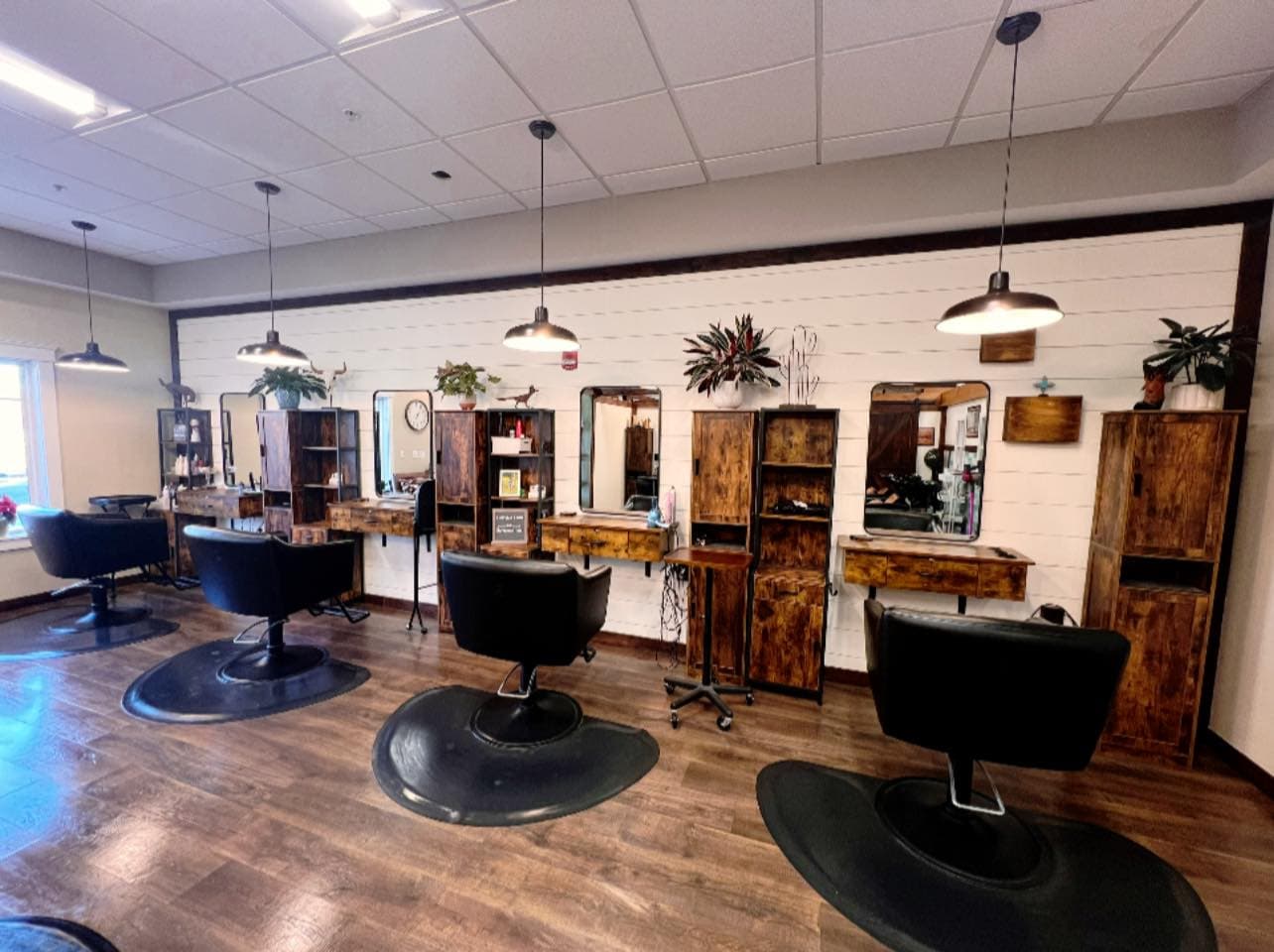 Styling stations with buffalo skull and warm wood beams